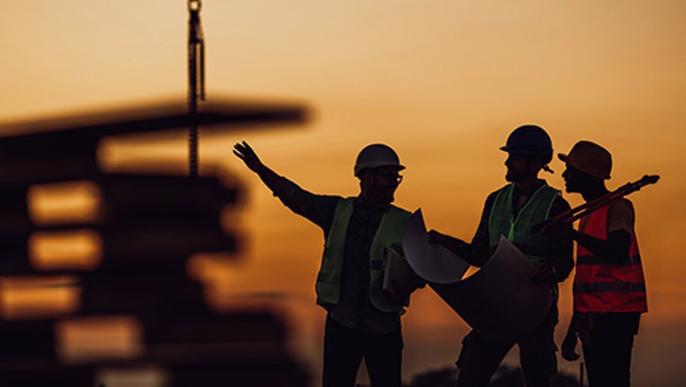 Construction site with cranes and workers